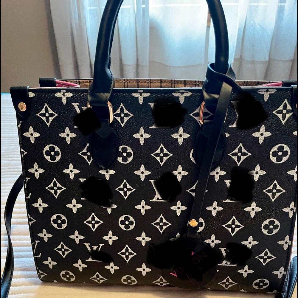 Black and hot pink satchel.